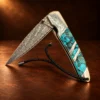 Liner Lock Damascus Folding Pocket Knife w/ Turquoise, MOP, & Wood Handle — detail view 3